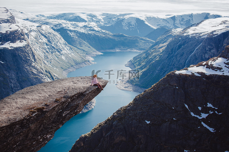 girl   on a rock , Norway fjords