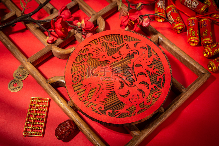 新年春节龙年剪纸红色背景摆放摄