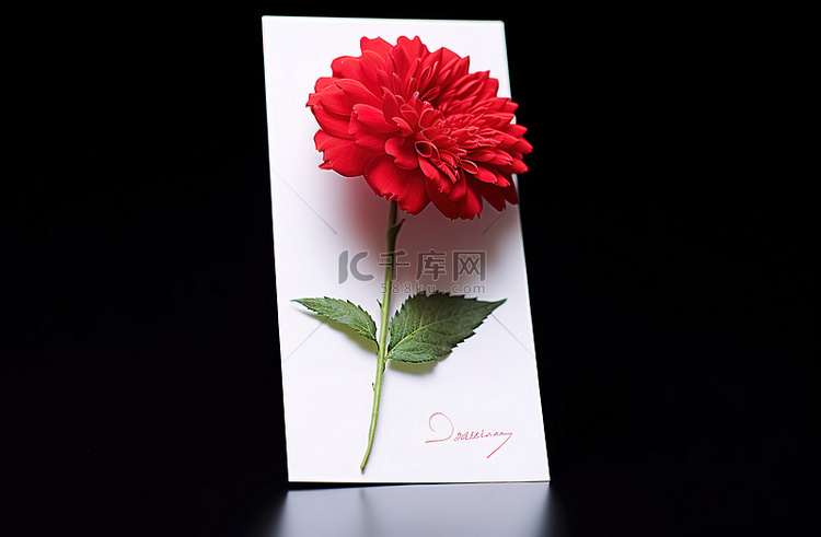 一张带有红花的感谢卡
