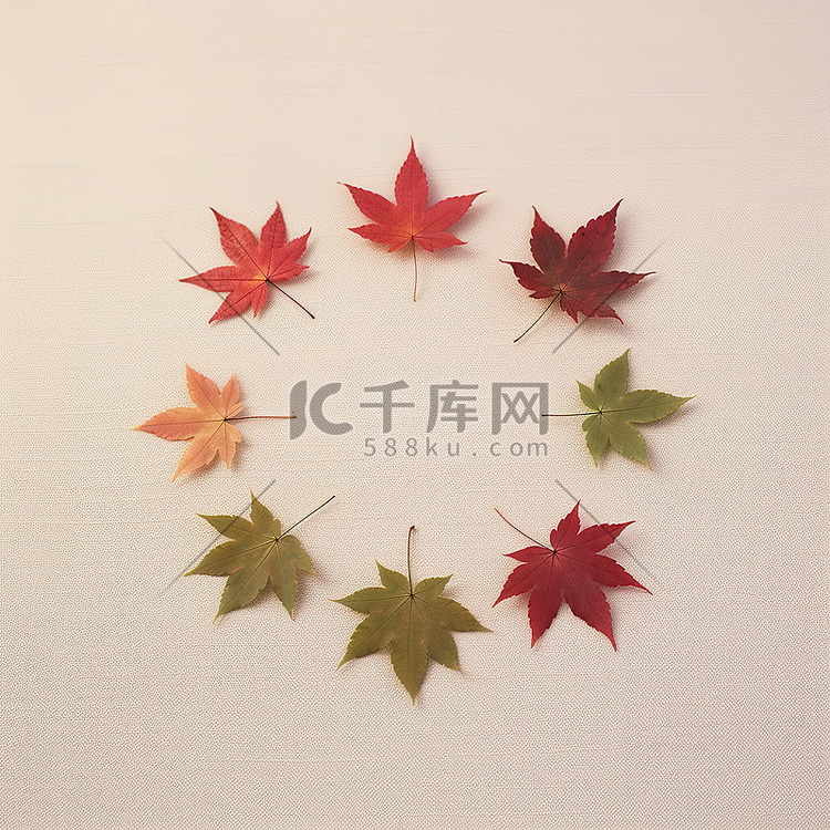 五片秋叶在米色地毯上排列成圆圈