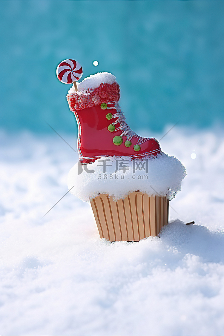 一只小靴子和一张纸坐在雪地里