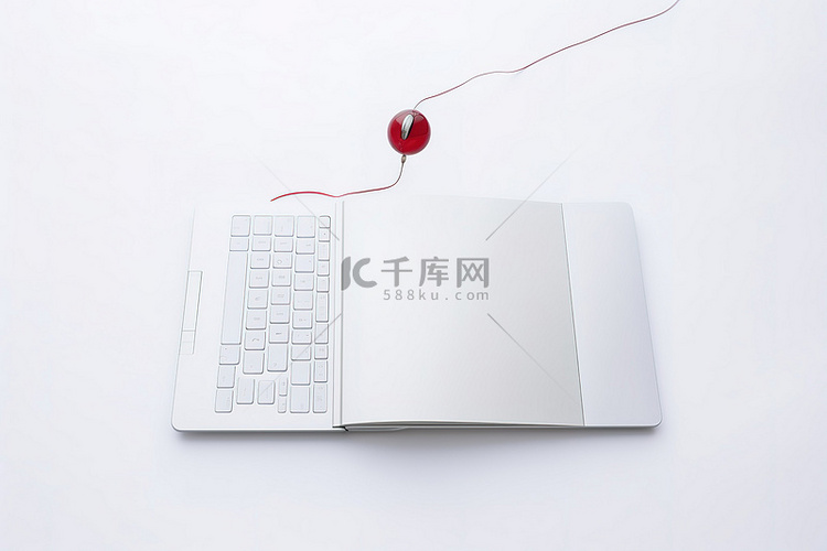白色背景上的笔记本和电脑鼠标