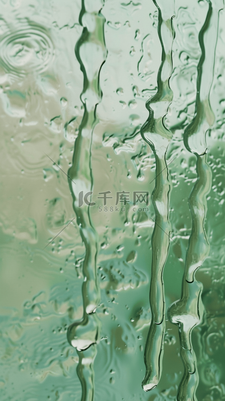 春天绿色玻璃窗上的雨点设计