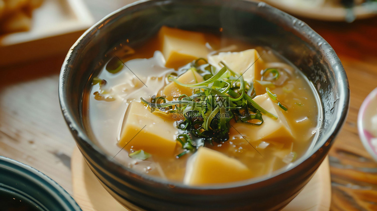 豆腐葱花汤水餐具摄影照片