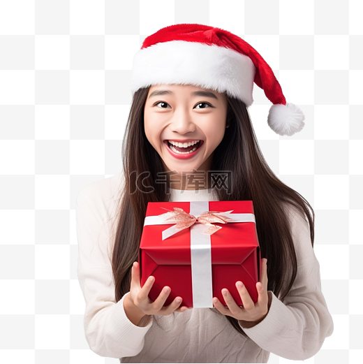 戴着圣诞帽拥抱礼盒的亚洲女孩欢呼雀跃，圣诞快乐图片