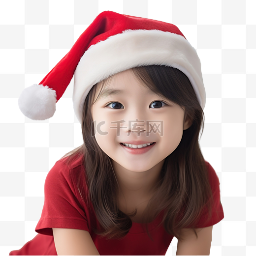 戴着圣诞帽笑脸坐在沙发上的可爱亚洲女孩图片