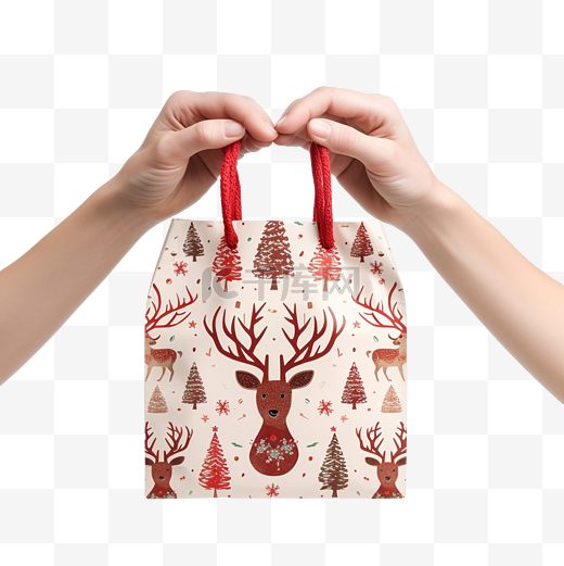 手里拿着可爱的驯鹿装饰的圣诞礼物袋图片