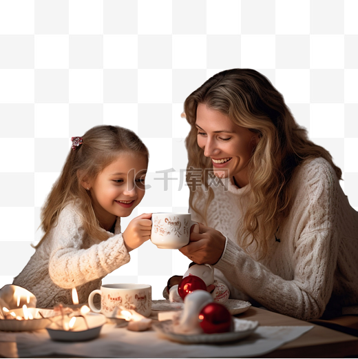 女孩和母亲在家里的圣诞厨房里用杯子喝茶图片