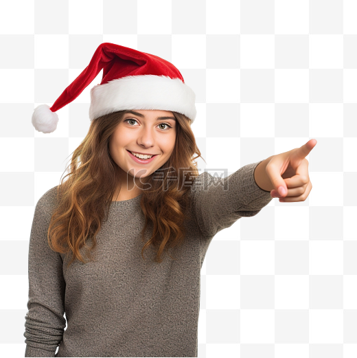 戴着圣诞帽的女孩用食指指着没有聚焦的墙壁图片