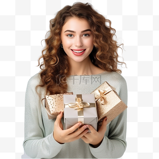 穿着圣诞装饰品衣服的女孩拿着礼盒图片