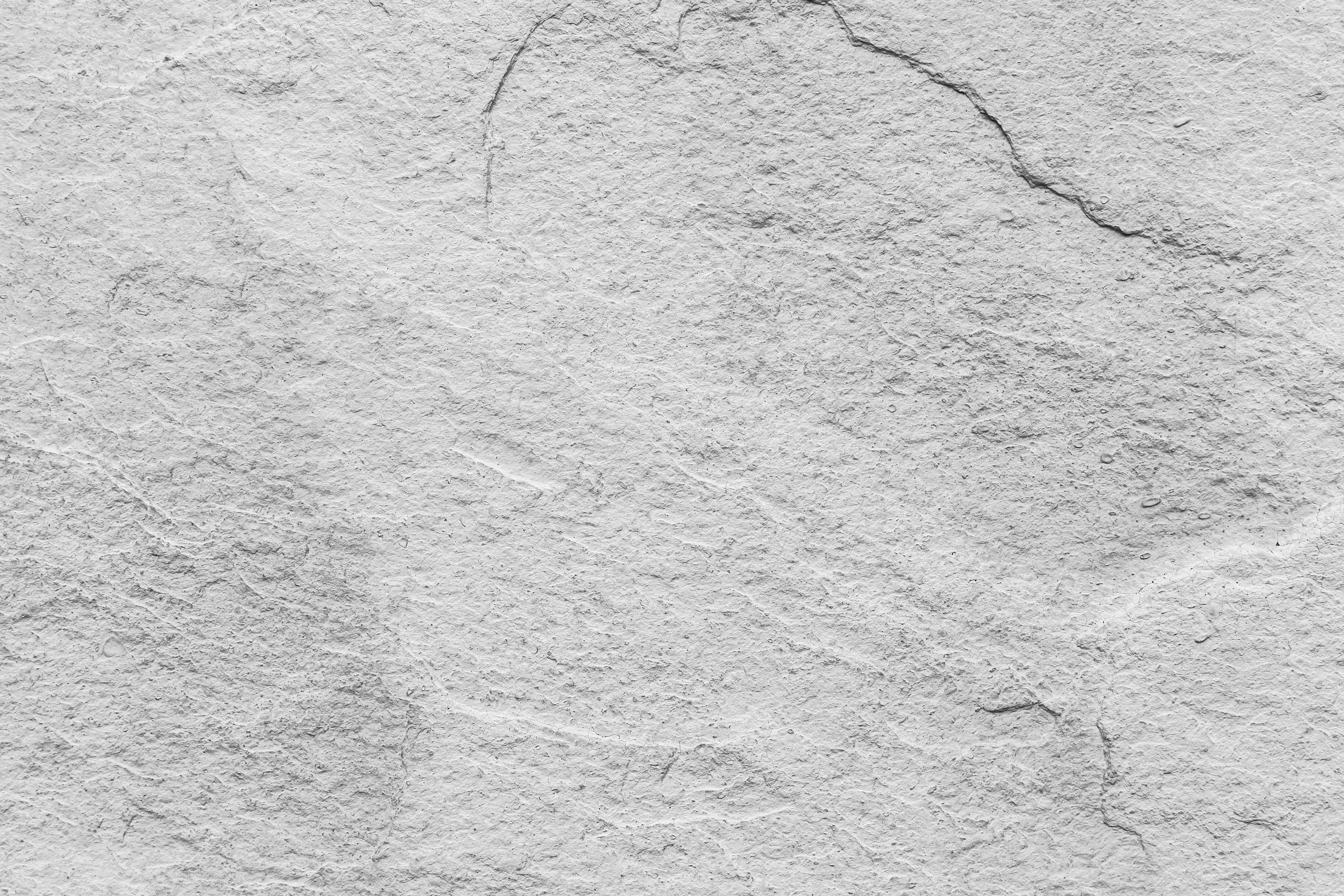 白色花岗岩石的结构和无缝背景图片