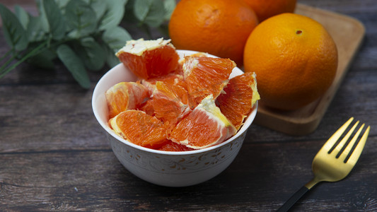 柚子橘子摄影照片_夏日水果血橙摄影图