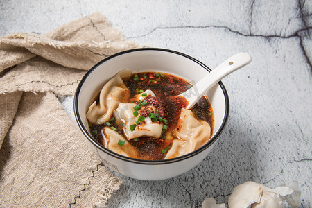 美食酸汤水饺摄影图