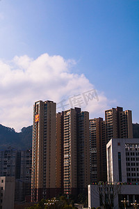城市建筑蓝天海报背景摄影图
