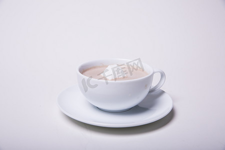 玛奇朵摄影照片_热饮糖块咖啡饮品摄影图 