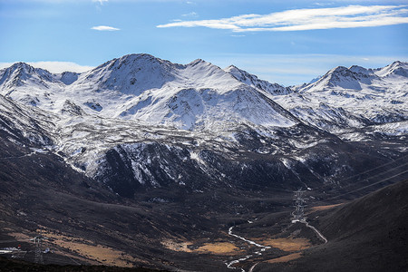 下雪花摄影照片_雪山下公路摄影图