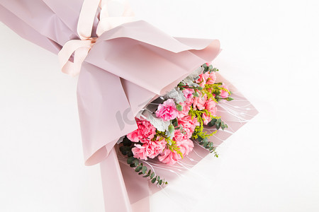 三八女神节粉色花束鲜花康乃馨摄影图