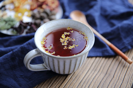 健脾摄影照片_养生茶花茶山楂茶桂花茶摄影图