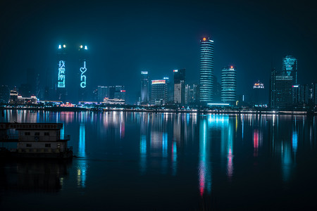 波普风格海报促销摄影照片_城市夜景赛博朋克风格南昌双子塔摄影图