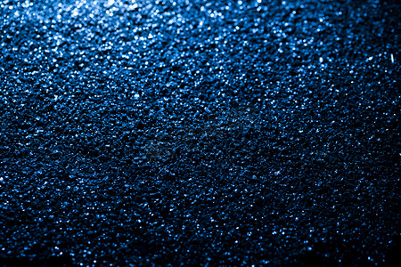 蓝色磨砂质感摄影照片_蓝色亮片质感纹理