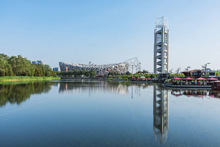 北京鸟巢玲珑塔水中倒影摄影图摄影图