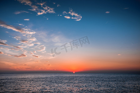 夏天摄影照片_日照海边日出摄影图