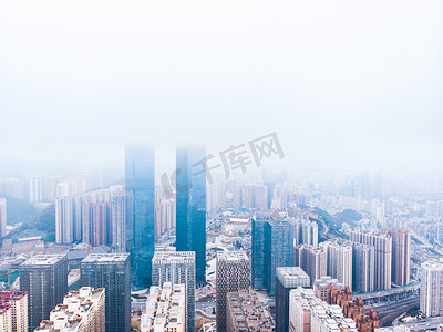 云雾ppt摄影照片_云雾中的贵阳双子塔城市群摄影图