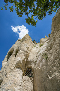 壁摄影照片_卡帕多奇亚岩壁洞窟摄影图