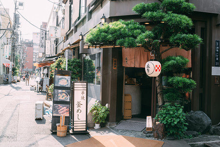 日式樱花底纹摄影照片_日本东京日式料理店居酒屋摄影图