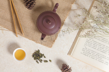 茶壶茶书摄影图