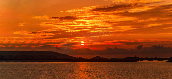 夕阳海摄影照片_福建漳州市半月湾夕阳自然风景摄影图