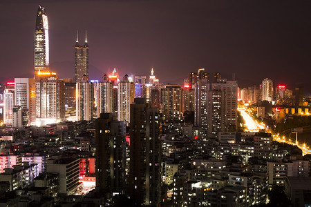 城市夜景繁华摄影照片_高空拍摄灯火通明城市夜景摄影图