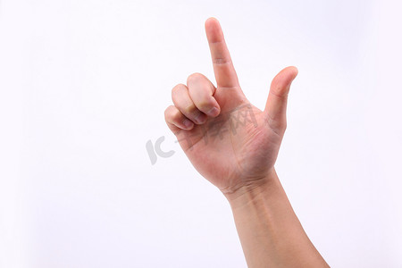 拇指手势摄影照片_代表数字手势