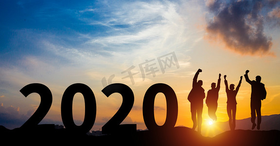 国潮2020摄影照片_日落剪影跨越2020摄影图