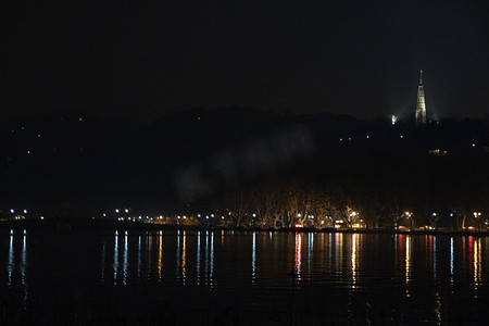 背景简约线条摄影照片_夜景西湖城市灯光摄影图