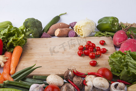 俯拍蔬菜切菜板摄影图配图