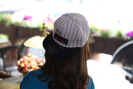 夏天女士棒球帽鸭舌帽摄影图