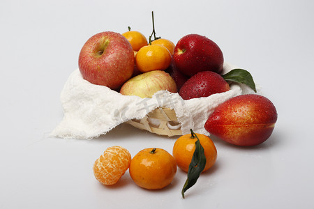 水果篮水果苹果油桃橘子摄影图