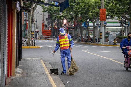 城市劳动者摄影照片_街头环卫工人