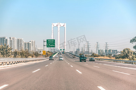 高速道路摄影照片_前进平胜大桥高速城市公路摄影图