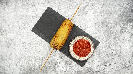 烧烤玉米摄影图