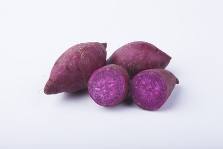 新鲜切开软糯紫薯摄影图 