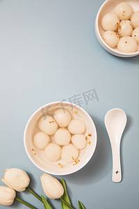 吃汤圆喽摄影照片_煮熟的汤圆元宵摄影图