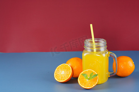 橙子橙汁摄影图