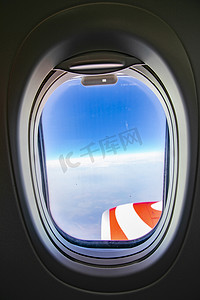 飞机窗口茫茫云海摄影图