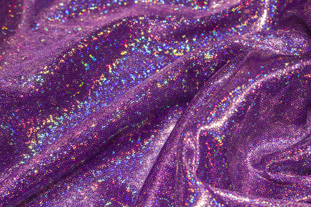 镭射粒子圈摄影照片_紫色镭射布料摄影图配图