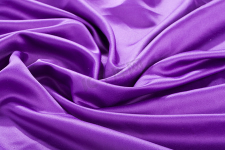 织物纹理摄影照片_紫丝绸质感