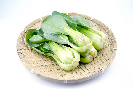 小油菜择菜黄叶摄影照片_蔬菜青菜摄影图