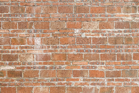 砖条墙石砖墙摄影照片_红色的砖墙