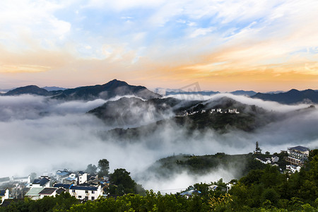 云海剪纸摄影照片_坡山阳光云海摄影图